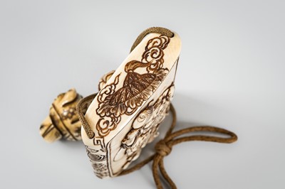 Lot 256 - TAKACHIKA: A FINE IVORY THREE-CASE INRO DEPICTING EBISU AND DAIKOKU