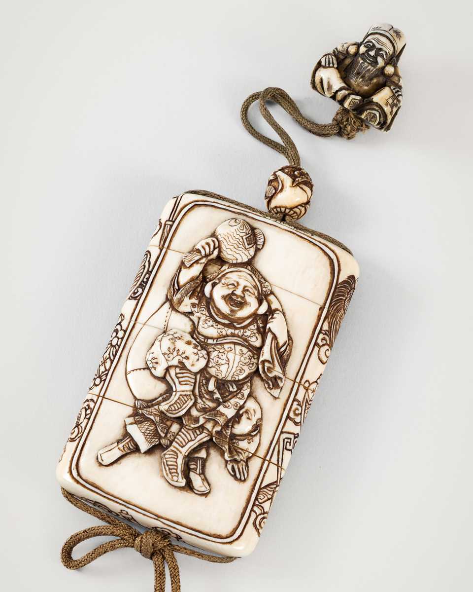 Lot 256 - TAKACHIKA: A FINE IVORY THREE-CASE INRO DEPICTING EBISU AND DAIKOKU