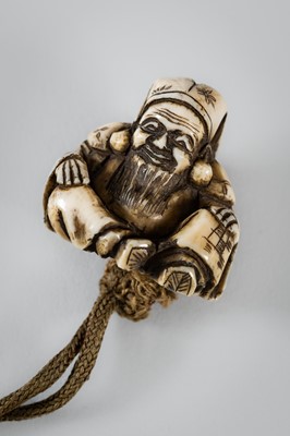 Lot 256 - TAKACHIKA: A FINE IVORY THREE-CASE INRO DEPICTING EBISU AND DAIKOKU