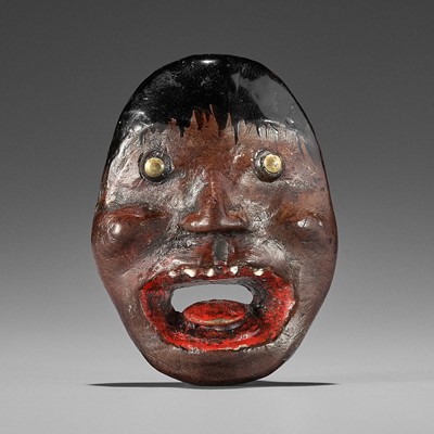 Lot 496 - AN UNUSUAL LACQUERED WOOD REVERSIBLE MASK NETSUKE OF A MONSTROUS HEAD