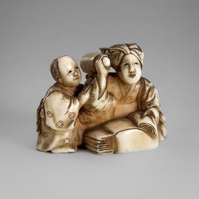 Lot 1485 - SHOJOSAI: AN IVORY NETSUKE OKIMONO OF A WOMAN BEATING CLOTH