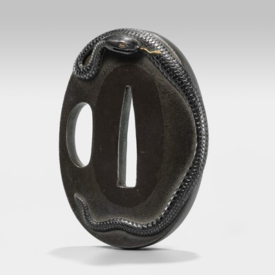 Lot 73 - AN IWAMOTO SCHOOL SHAKUDO TSUBA WITH SNAKE, WITH NBTHK CERTIFICATE