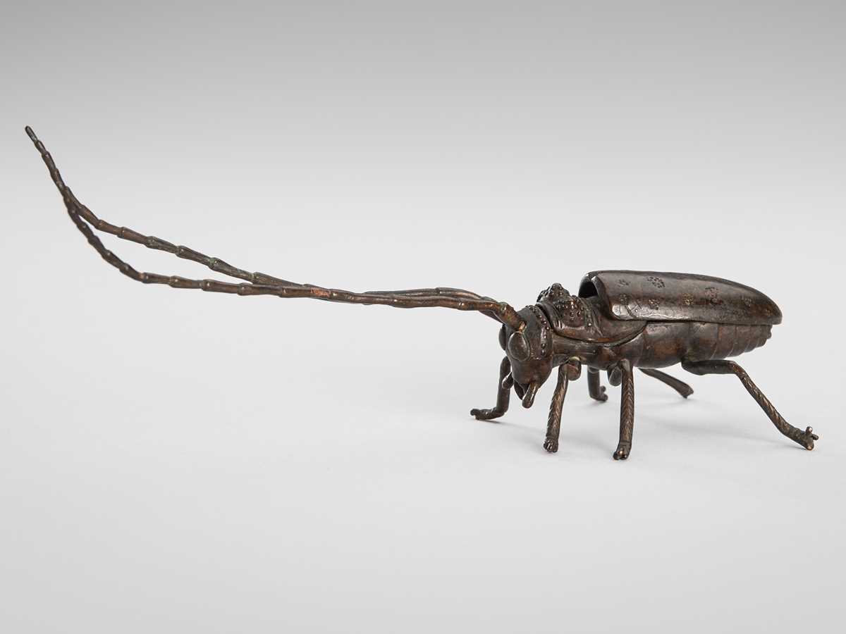 Lot 47 - AN ARTICULATED BRONZE OKIMONO OF A BEETLE