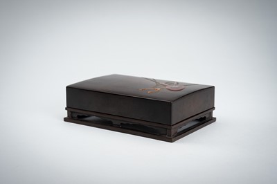 Lot 155 - A LACQUER BOX AND COVER DEPICTING WEAPONS