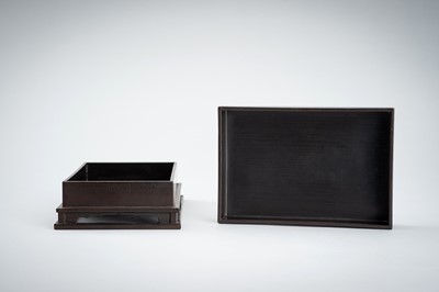 Lot 155 - A LACQUER BOX AND COVER DEPICTING WEAPONS