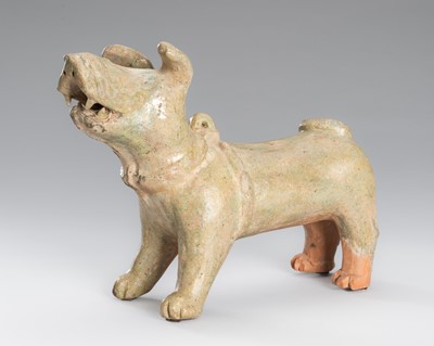Lot 1075 - A POTTERY FIGURE OF A DOG, HAN DYNASTY