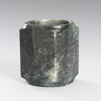 Lot 939 - AN ARCHAISTIC DARK-GREEN JADE CONG