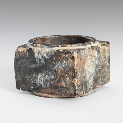 Lot 894 - AN ARCHAISTIC BROWN AND RUSSET HARDSTONE CONG