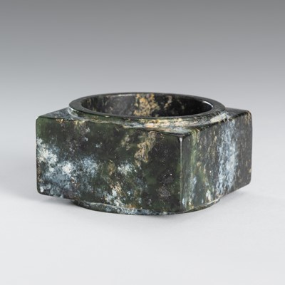 Lot 941 - AN ARCHAISTIC SPINACH-GREEN JADE CONG
