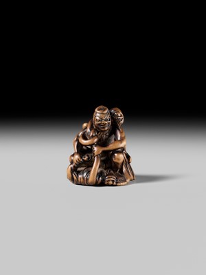 Lot 440 - KOKUZAN: A RARE WOOD NETSUKE DEPICTING A WARRIOR STRUGGLING WITH A YOKAI