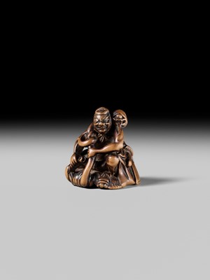 Lot 440 - KOKUZAN: A RARE WOOD NETSUKE DEPICTING A WARRIOR STRUGGLING WITH A YOKAI