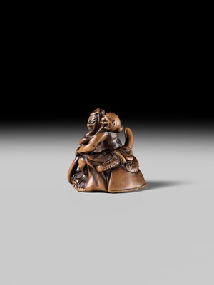 Lot 440 - KOKUZAN: A RARE WOOD NETSUKE DEPICTING A WARRIOR STRUGGLING WITH A YOKAI