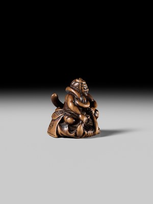 Lot 440 - KOKUZAN: A RARE WOOD NETSUKE DEPICTING A WARRIOR STRUGGLING WITH A YOKAI