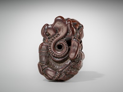 Lot 434 - A FINE EDO SCHOOL WOOD NETSUKE OF ARIOMARU STRUGGLING WITH AN OCTOPUS