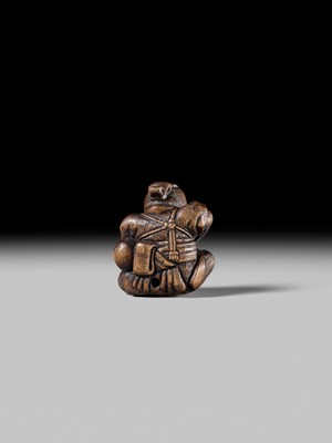SUKEYUKI: A FINE WOOD NETSUKE OF A PERFORMING MONKEY
