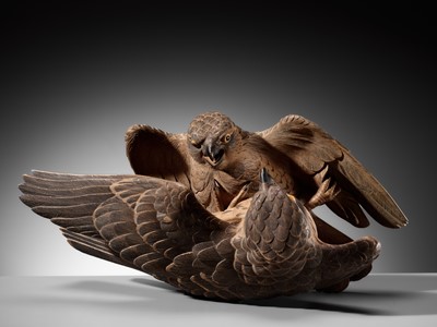 A LARGE WOOD OKIMONO OF TWO QUARRELING SPARROWS