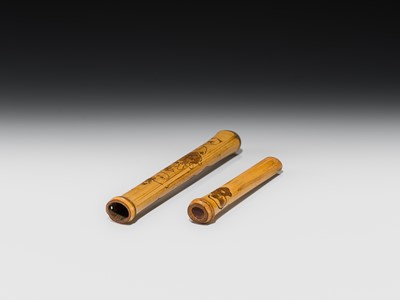 ASANO BOKKOKU: A FINE BAMBOO KISERUZUTSU (PIPE CASE) WITH MASKS