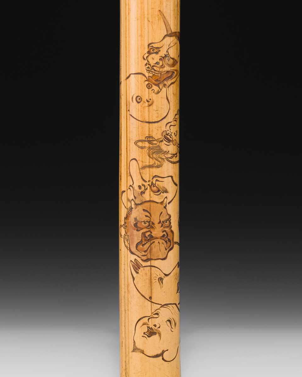 ASANO BOKKOKU: A FINE BAMBOO KISERUZUTSU (PIPE CASE) WITH MASKS