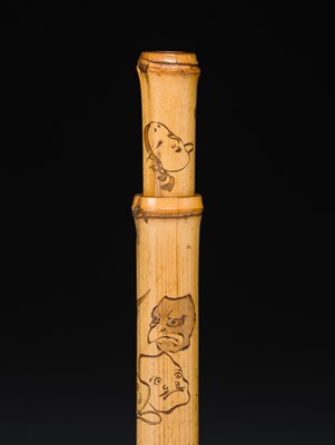 ASANO BOKKOKU: A FINE BAMBOO KISERUZUTSU (PIPE CASE) WITH MASKS
