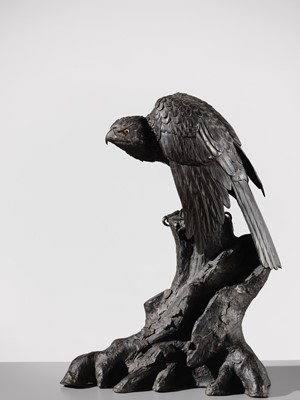 Lot 19 - A LARGE AND FINE BRONZE OKIMONO OF A HAWK ON A TREE TRUNK