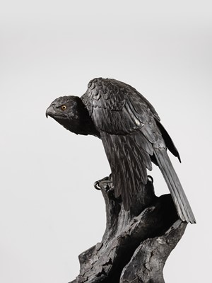 Lot 19 - A LARGE AND FINE BRONZE OKIMONO OF A HAWK ON A TREE TRUNK