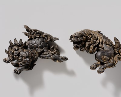 Lot 197 - A PAIR OF GILT LACQUER WOOD SHISHI, EDO PERIOD