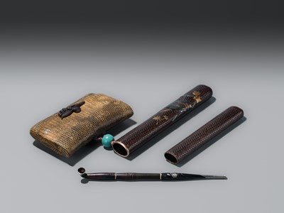 ISSHAKUSAI: A LACQUERED WOVEN RATTAN KISERUZUTSU (PIPE CASE) AND TABAKO-IRE (POUCH)