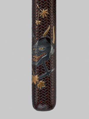 ISSHAKUSAI: A LACQUERED WOVEN RATTAN KISERUZUTSU (PIPE CASE) AND TABAKO-IRE (POUCH)