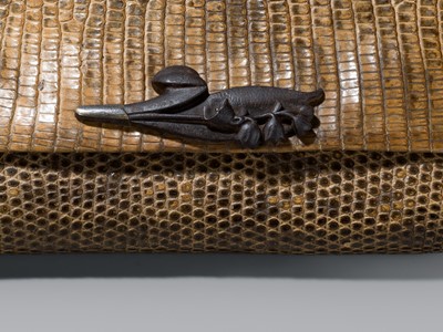 ISSHAKUSAI: A LACQUERED WOVEN RATTAN KISERUZUTSU (PIPE CASE) AND TABAKO-IRE (POUCH)