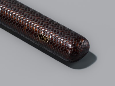 ISSHAKUSAI: A LACQUERED WOVEN RATTAN KISERUZUTSU (PIPE CASE) AND TABAKO-IRE (POUCH)