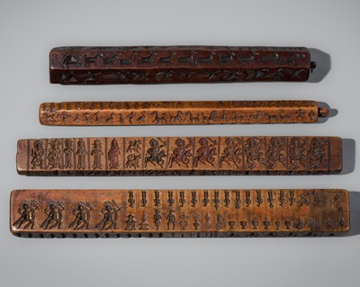 Lot 126 - A GROUP OF FOUR LARGE WOOD TORMA MOLD STICKS, ZANPAR, 18TH-19TH CENTURY