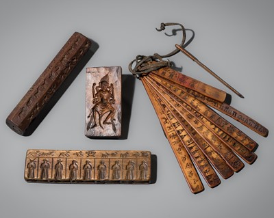 Lot 261 - A GROUP OF TSAMPA MOLD STICKS, TIBET, 17TH-19TH CENTURY