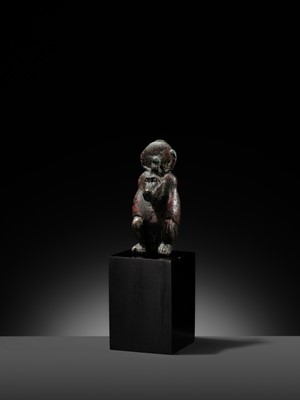 Lot 5 - A RARE BRONZE FIGURE OF A BABOON, LATE DYNASTIC PERIOD, DYNASTY XXVI