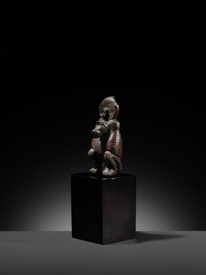 Lot 5 - A RARE BRONZE FIGURE OF A BABOON, LATE DYNASTIC PERIOD, DYNASTY XXVI