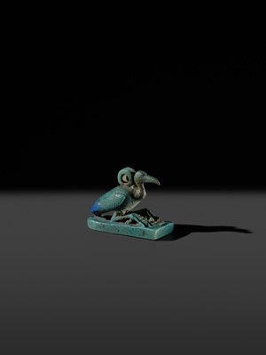 Lot 51 - AN ‘IBIS’ AMULET, BLUE AND GREEN BICHROME FAIENCE, LATE PERIOD, DYNASTY XXV-XXXI