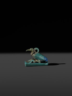 Lot 51 - AN ‘IBIS’ AMULET, BLUE AND GREEN BICHROME FAIENCE, LATE PERIOD, DYNASTY XXV-XXXI