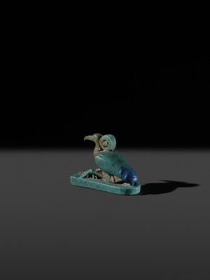 Lot 51 - AN ‘IBIS’ AMULET, BLUE AND GREEN BICHROME FAIENCE, LATE PERIOD, DYNASTY XXV-XXXI