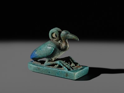 Lot 51 - AN ‘IBIS’ AMULET, BLUE AND GREEN BICHROME FAIENCE, LATE PERIOD, DYNASTY XXV-XXXI