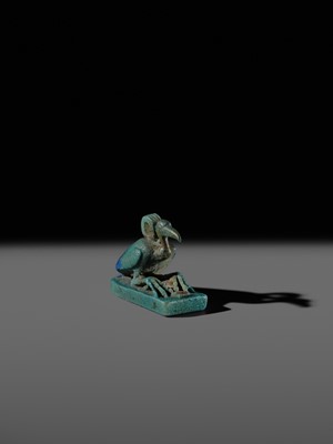 Lot 51 - AN ‘IBIS’ AMULET, BLUE AND GREEN BICHROME FAIENCE, LATE PERIOD, DYNASTY XXV-XXXI