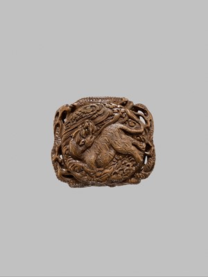 Lot 58 - A FINE WOOD TONKOTSU WITH DRAGONS AND A TIGER