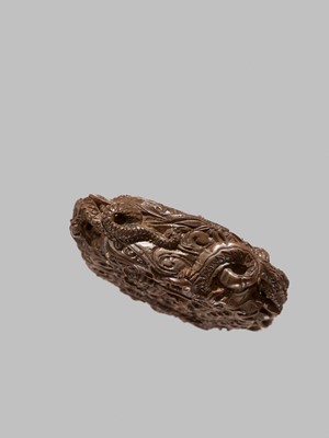 Lot 58 - A FINE WOOD TONKOTSU WITH DRAGONS AND A TIGER