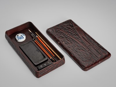 Lot 154 - A WOOD SUZURIBAKO (WRITING BOX) DEPICTING BAMBOO STALKS