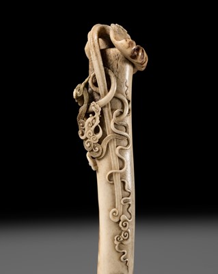 Lot 316 - HOSHUNSAI MASAYUKI: A FINE ANTLER SASHI NETSUKE OF A DRAGON ENCIRCLING A REISHI SCEPTER