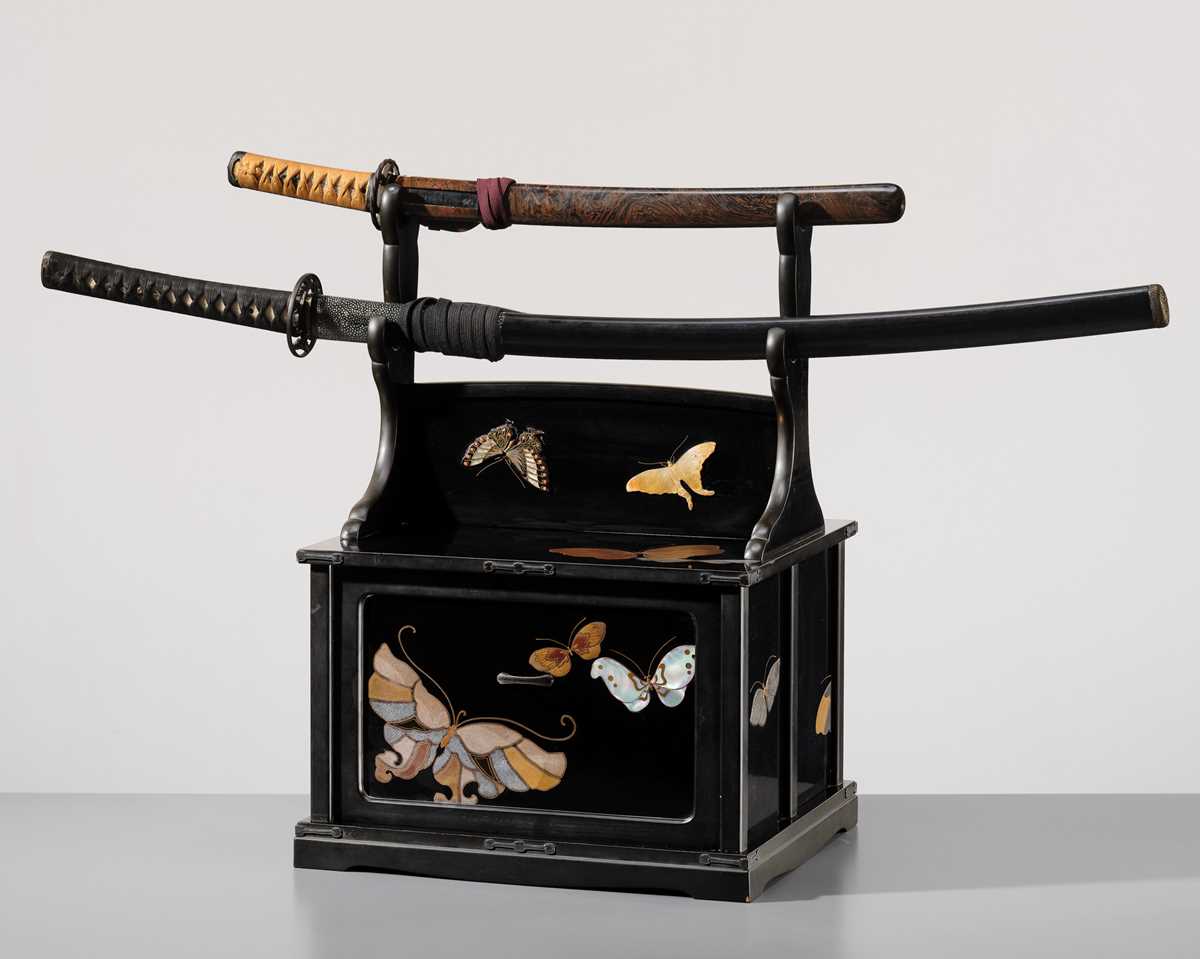 Lot 136 - UMEZAWA RYUSHIN: A SUPERB INLAID AND LACQUERED ‘BUTTERFLIES’ KATANA KAKE (SWORD STAND)