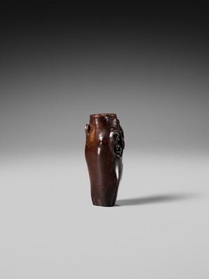 AN UNUSUAL AND RARE COCONUT NETSUKE OF MONKEYS AND A TOAD ON A PINE TREE