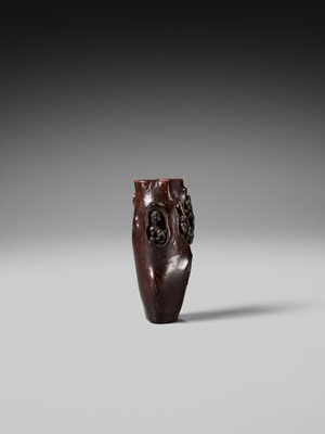 AN UNUSUAL AND RARE COCONUT NETSUKE OF MONKEYS AND A TOAD ON A PINE TREE