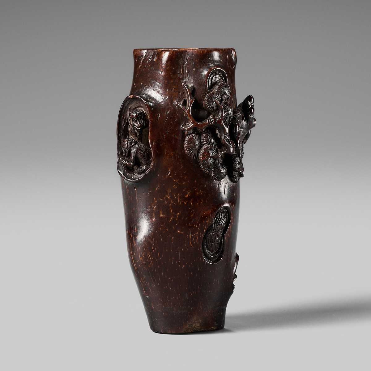 AN UNUSUAL AND RARE COCONUT NETSUKE OF MONKEYS AND A TOAD ON A PINE TREE