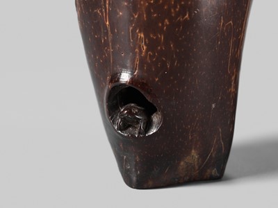 AN UNUSUAL AND RARE COCONUT NETSUKE OF MONKEYS AND A TOAD ON A PINE TREE