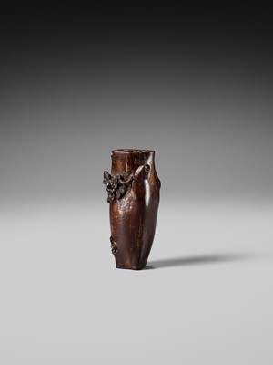 AN UNUSUAL AND RARE COCONUT NETSUKE OF MONKEYS AND A TOAD ON A PINE TREE
