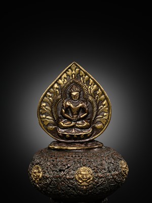 Lot 11 - A PARCEL-GILT COPPER REPOUSSÉ BUDDHIST RITUAL CONTAINER, NEPAL, 16TH-17TH CENTURY